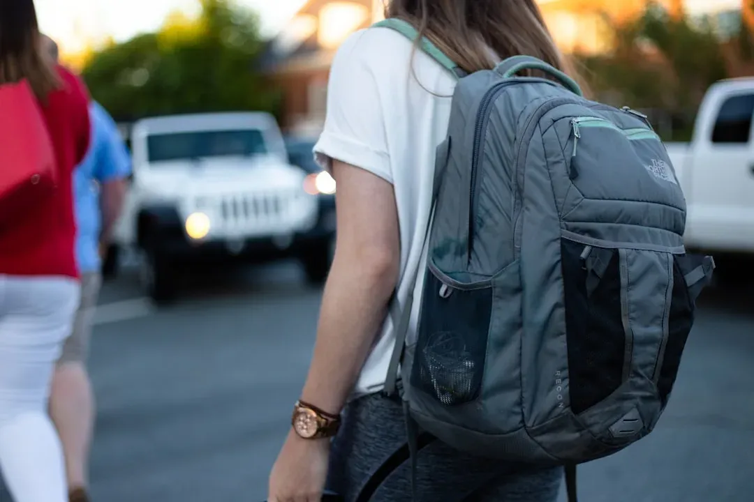 navigating public transport with heavy backpack